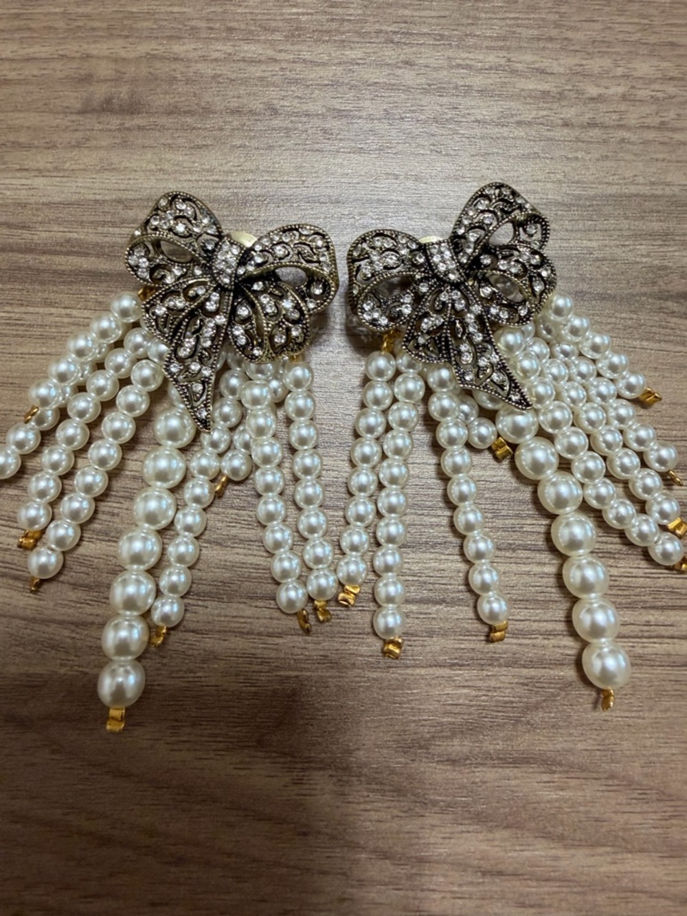 Sassy Jones Pearl Fringe Bow Drop Earrings in White and Gold